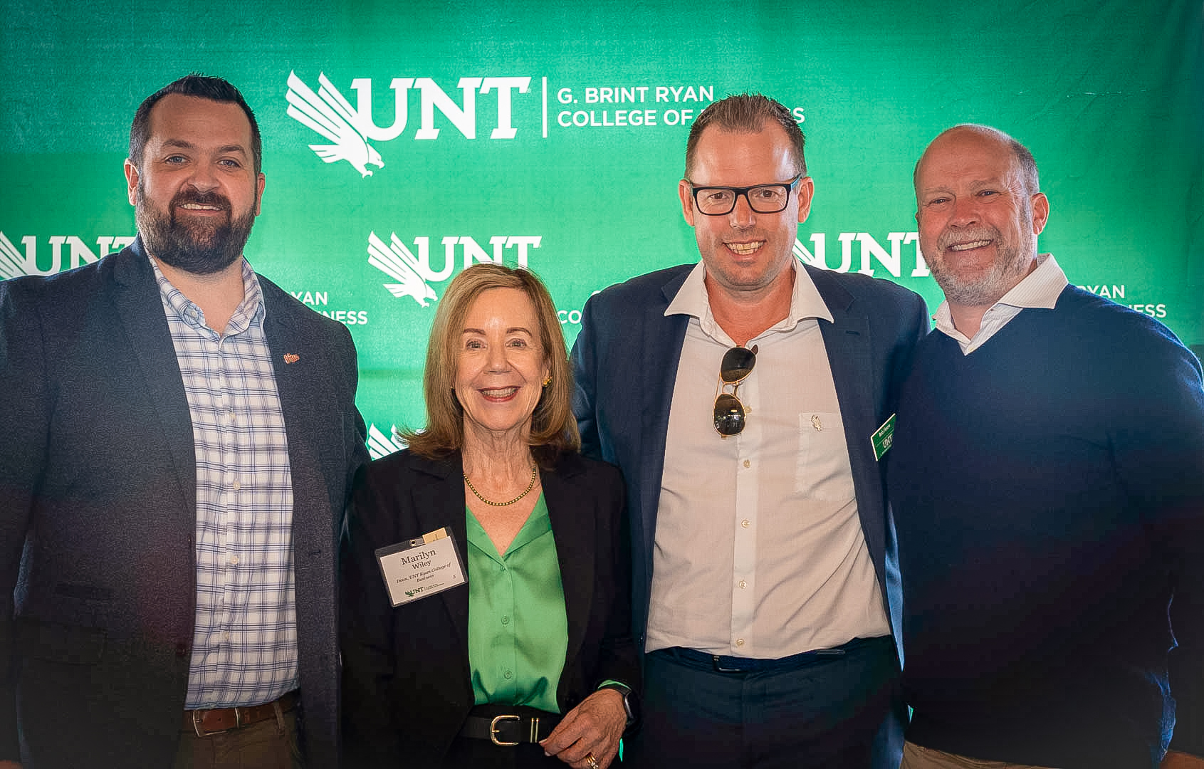 From left: Visit Frisco Assistant Executive Director Josh Dills, Marilyn Wiley, Bob Heere and FC Dallas President Dan Hunt