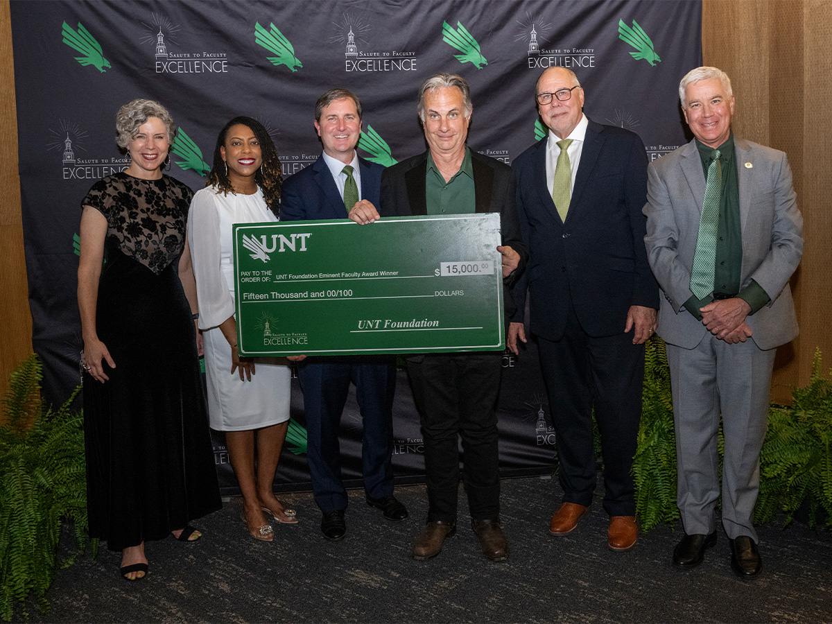 From left: Holly Hutchins, Vice Provost for Faculty Success; Angie Cartwright, Assistant Vice Provost for Faculty Success; Tim Dwight, Board Member of UNT Foundation; James Meernik, Regents Professor of political science; UNT President Neal Smatresk; and Provost and Vice President for Academic Affairs Michael McPherson 