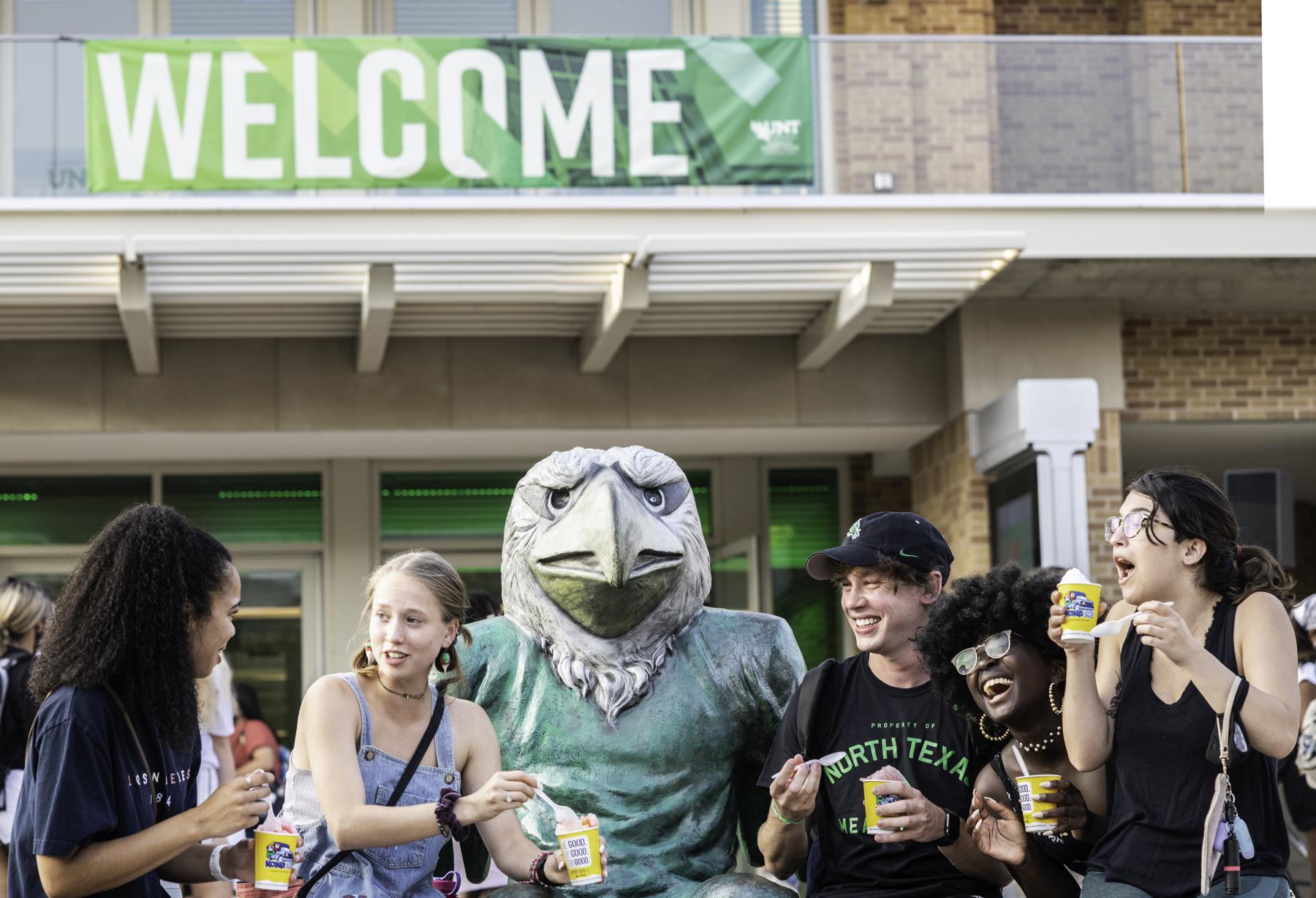 students sitting together outside the UNT Union