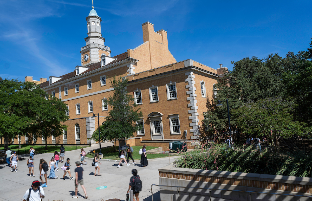 Students cross the UNT library mall in front of Hurley Admin Building