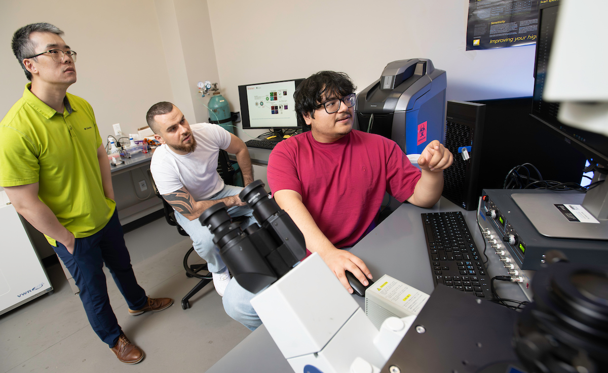 Adam Yang with Ph.D. students Marcel El-Mokahal and Angello H. Gomez