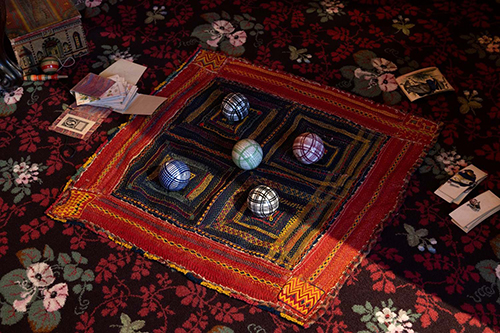 Photo of a textile and ball-based game played in square fabric quadrants