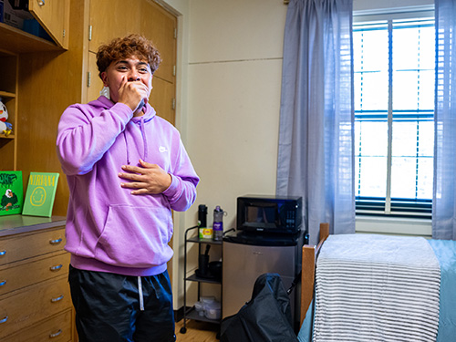 Bryan Roberts in his dorm room