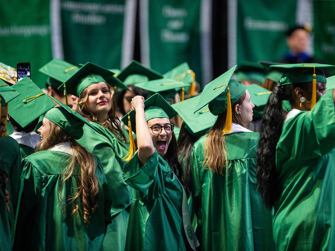 Graduates standing around in a crowd