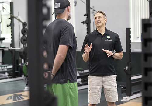 Assistant head coach and head strength & conditioning coach Bryan Kegans (left) and Dr. Trent Petrie (right)