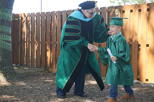 College of Education’s Interim Dean Ruthanne “Rudi” Thompson awarded diplomas at the ceremony