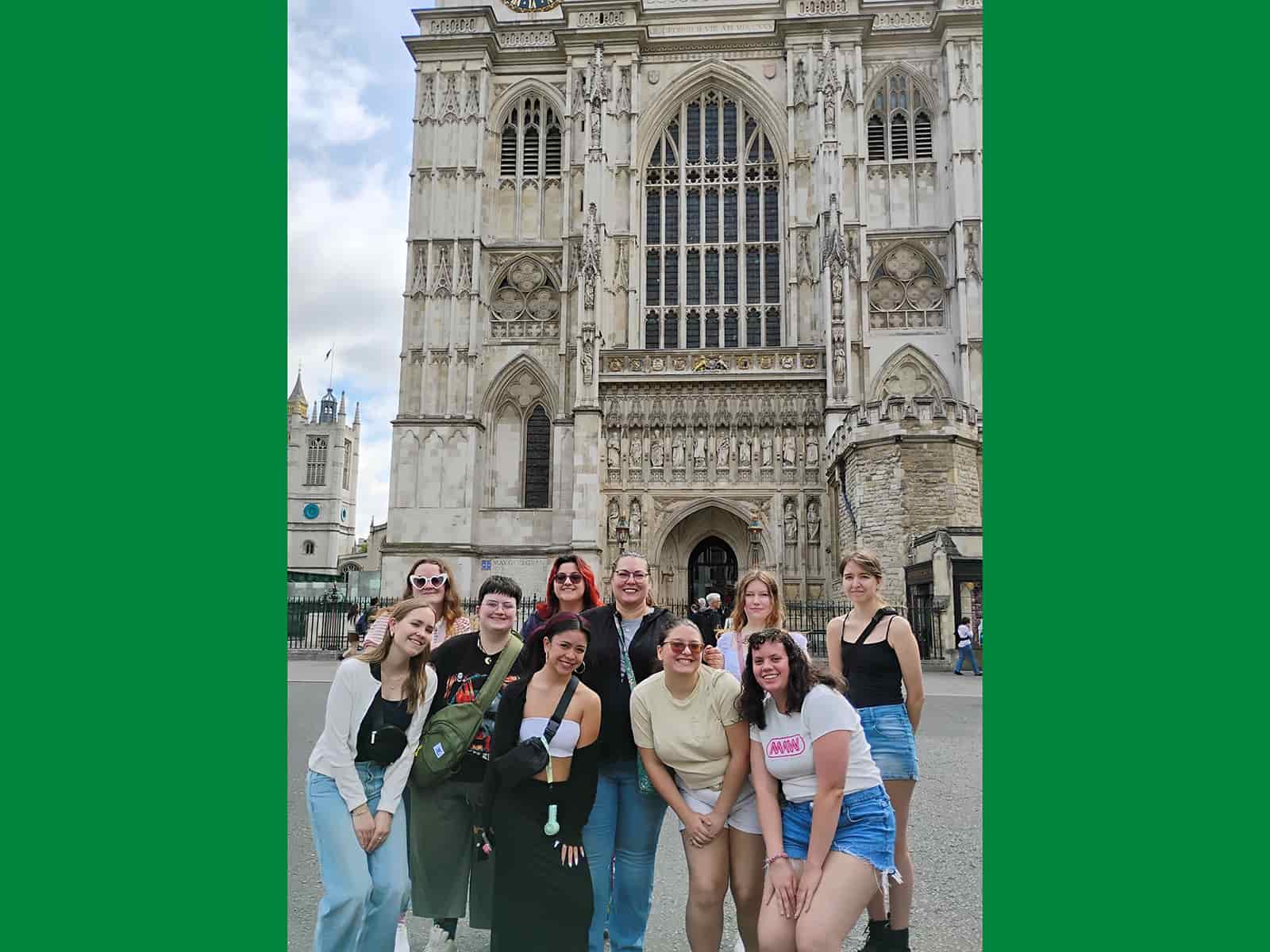 Students pose outside Westminster Abbey, London, England
