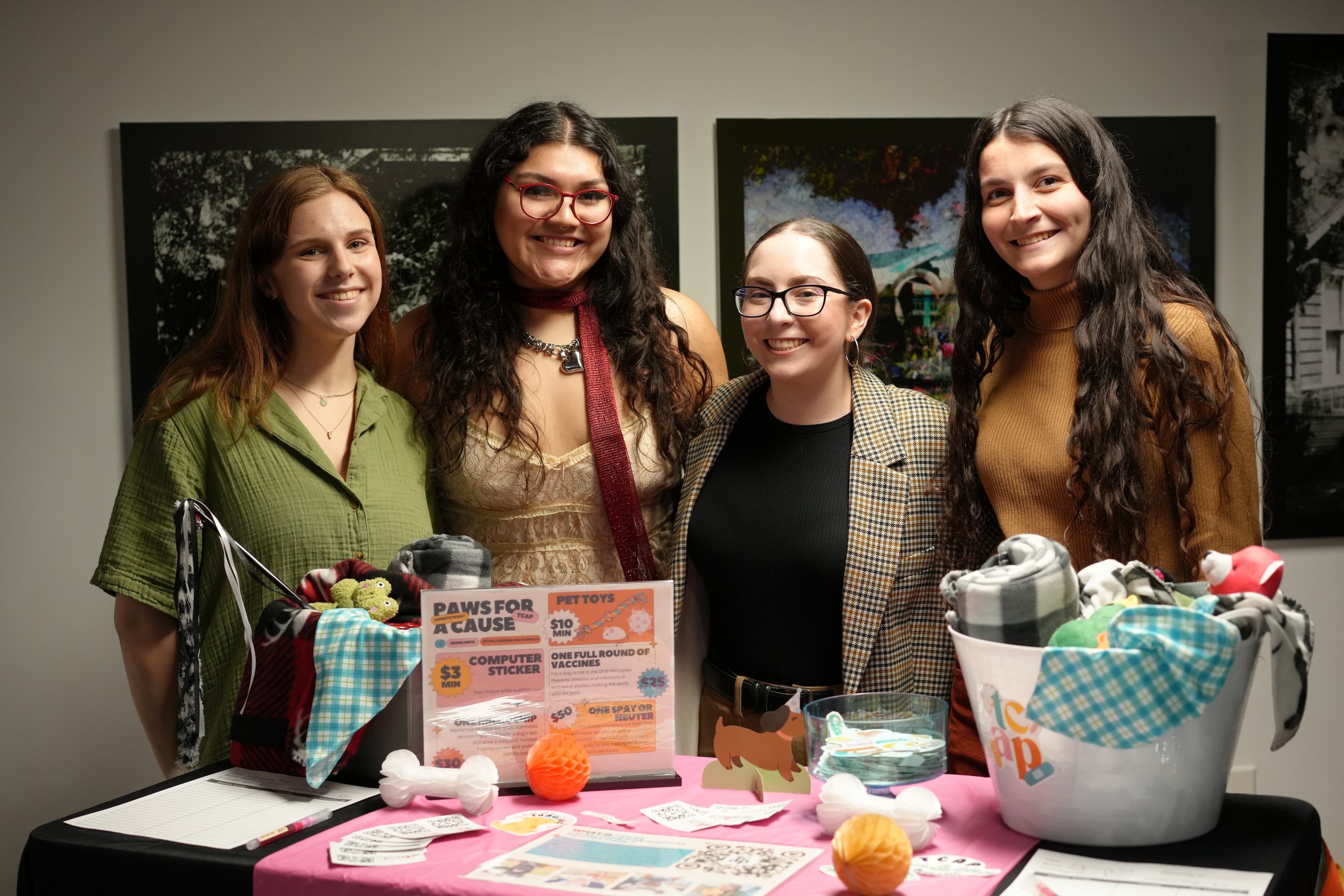 Students in a multidisciplinary social entrepreneurship class gather at the UNT CoLab to celebrate student developed crowdfunding campaigns.