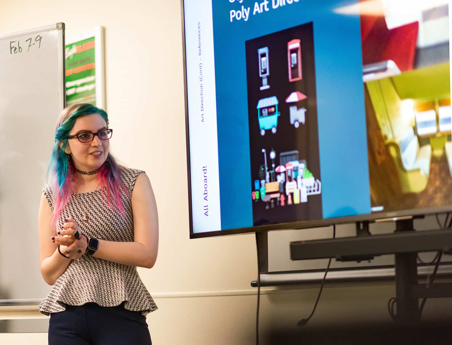 A student presents preliminary art design for a video game