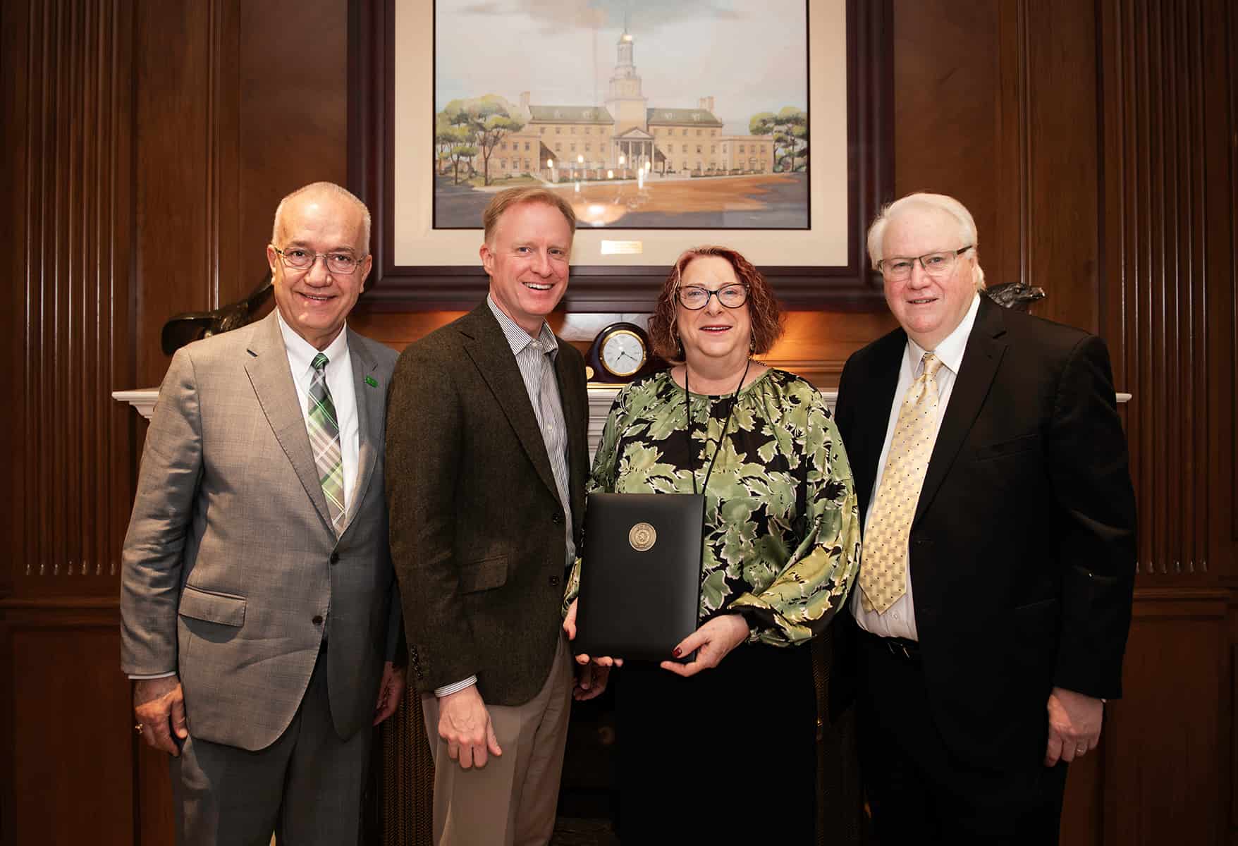From left: UNT College of Music Dean John Richmond, UNT President Harrison Keller, Kathryn Kuddes, and Kent Kuddes
