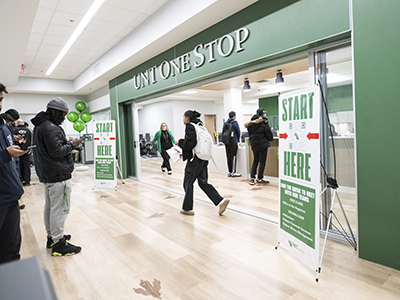 People waiting outside the new UNT One Stop