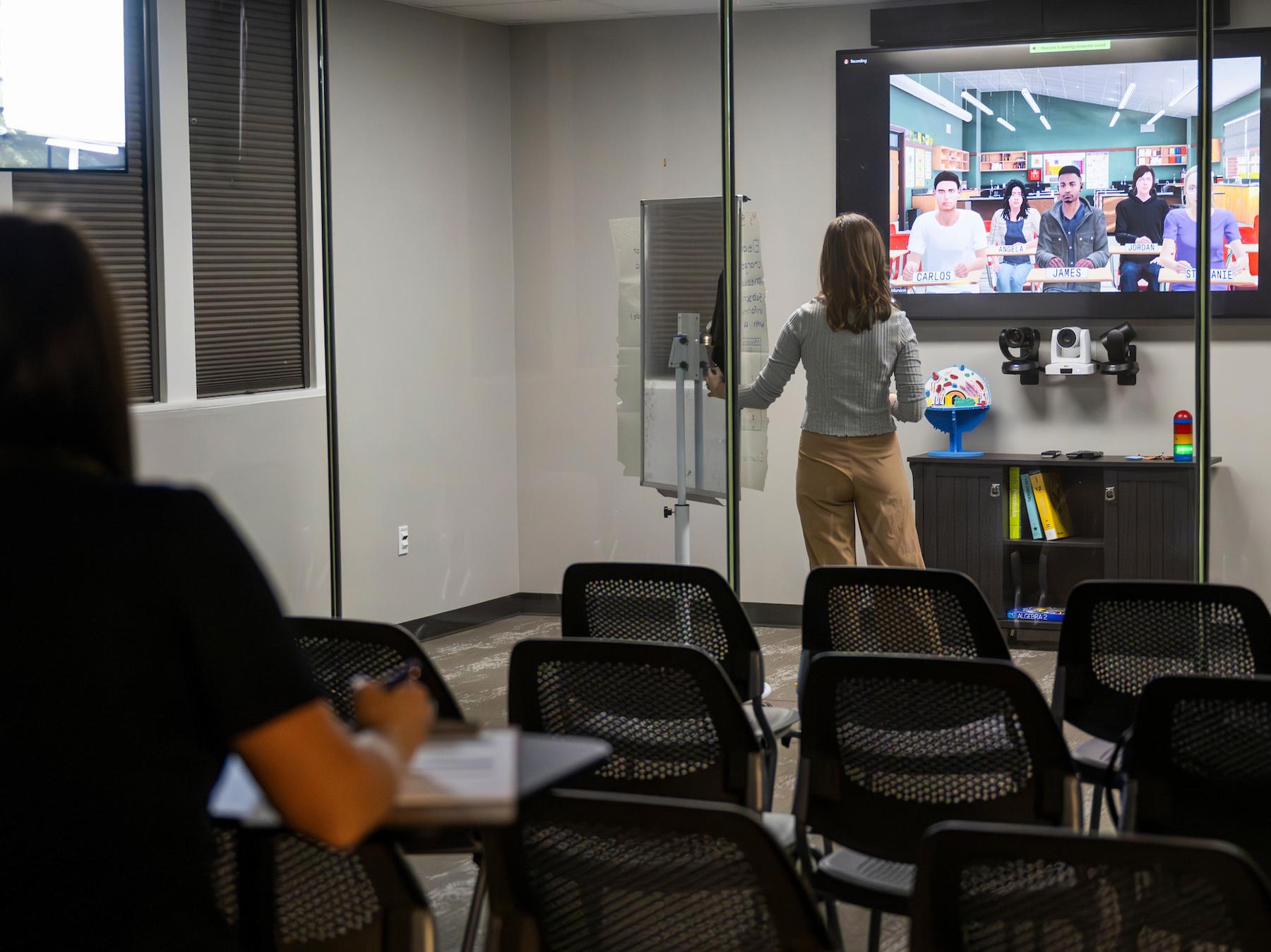 Cindy Watson also observes sessions in the Mursion Lab