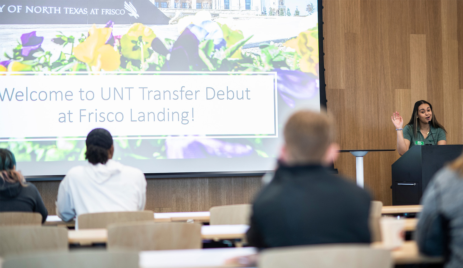 A Transfer Ambassador gives a PowerPoint presentation to prospective students at Transfer Debut