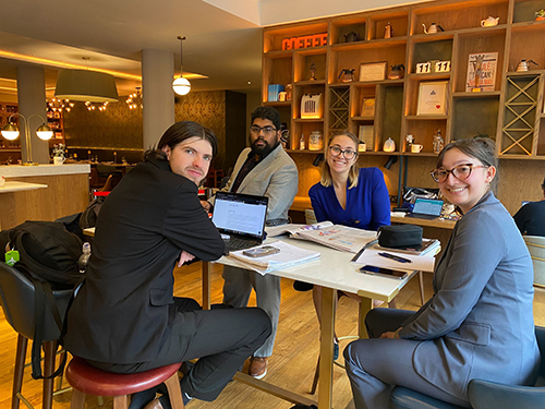 UNT Debate team members Nicholas Grotberg, Daniel Diraviyam, Sophie Polma and Alaia Snell prepare for competition