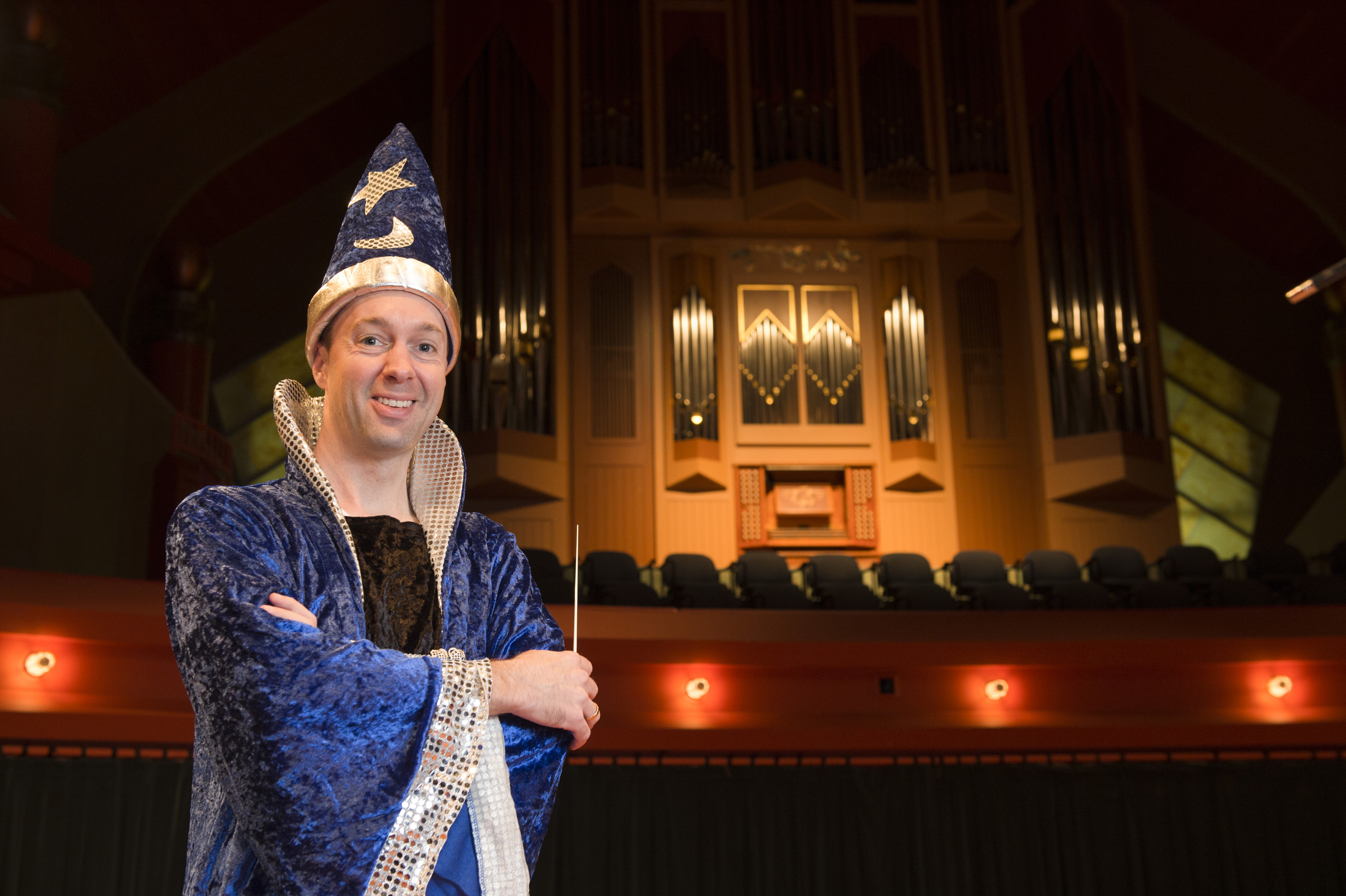 Clay Couturiaux in a wizard costume, cape and hat