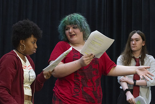 Students rehearse lines for a play