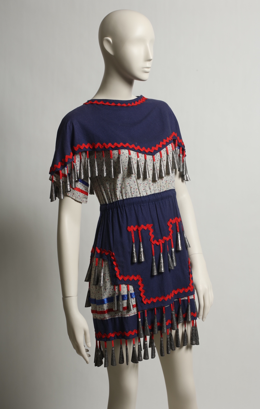 Fashion jingle dress by an unknown Native American designer, ca. 1950. UNT Texas Fashion Collection, Gift of Joy Losee. Photo courtesy of Brandon Nichols.