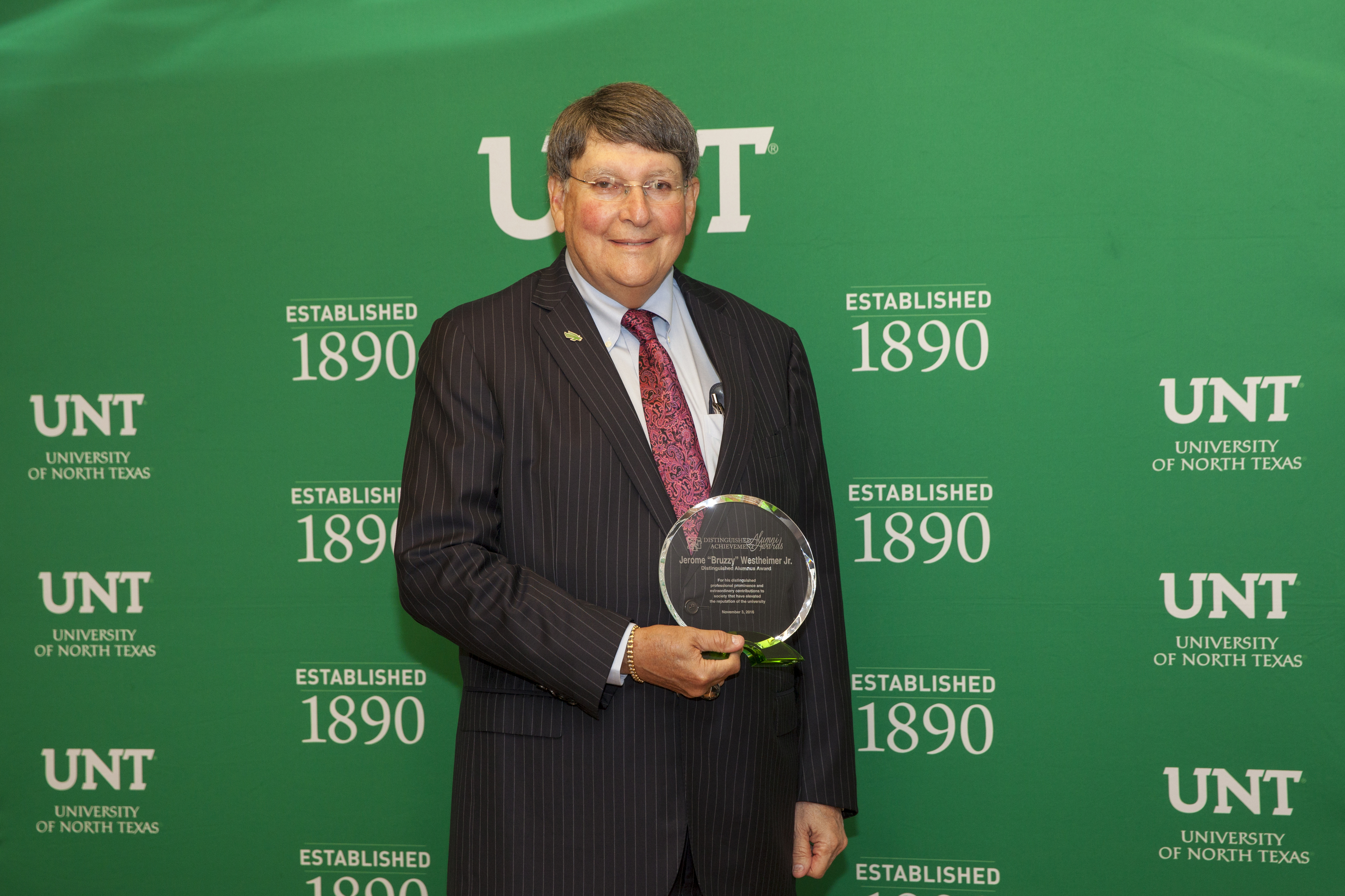 Oklahoma businessman and philanthropist Jerome “Bruzzy” Westheimer, pictured with the university’s Distinguished Alumni Award in 2016, is funding the Westheimer New Venture Competition.