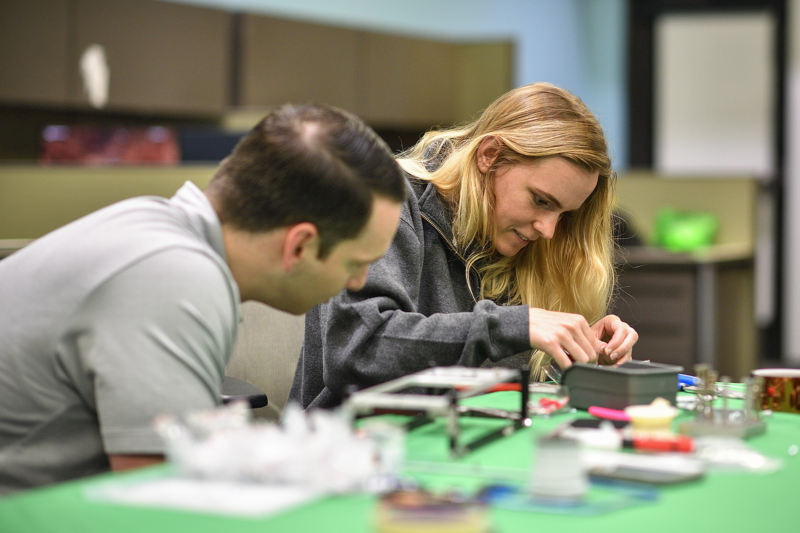 Brittney Thurston (Right) works with Michael Ayers on their Shape Memory Alloy system
